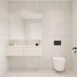 Glacier White Corian bathroom featuring a custom vanity, standalone basin, toilet, and mirror. Solid Surface design with 3D configurator.