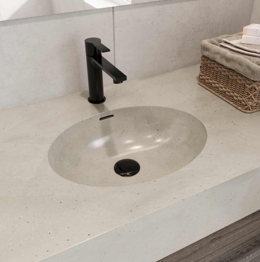 Artista Sage DuPont Corian bathroom vanity. Custom solid surface countertop with standalone basin and black faucet. 3D bathroom builder design.
