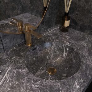 Cosmos Prima DuPont Corian vanity with a round basin and gold faucet. Custom bathroom vanity, solid surface, and standalone basin. 3D bathroom builder.